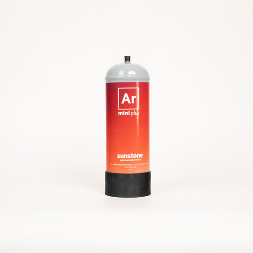 A small tank of compressed argon gas for jewelry welding