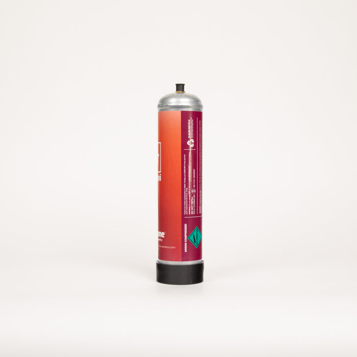 Cylindrical welding gas container with a red label on a white background